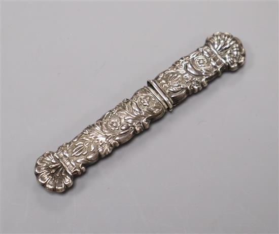 An early 20th century embossed white metal bodkin case, 90mm.